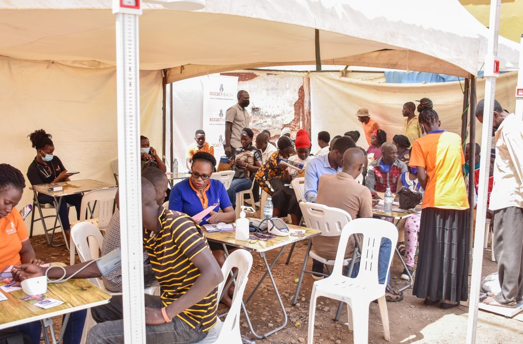 Free screening services and onsite doctor consultations at a community outreach event in Wandegeya market 